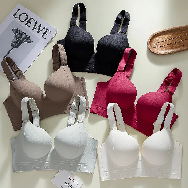 Collection of bras in various colors on a light background with LOEWE branding.