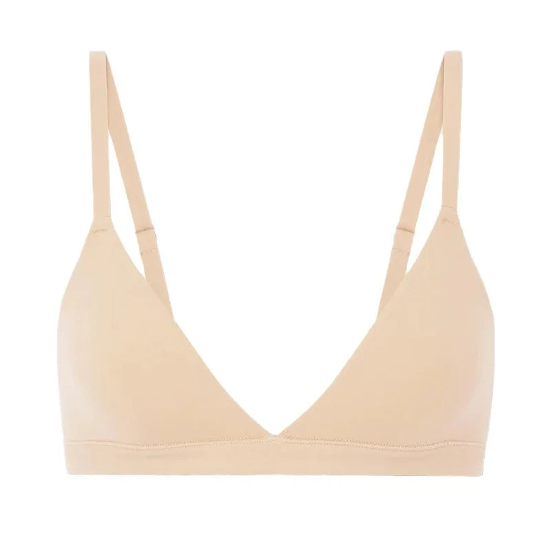 A beige seamless underwire bra with thin adjustable shoulder straps, shown against a plain white background.