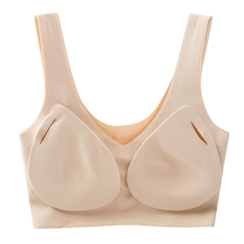 A beige wireless bra with built-in underwire pads, shown against a plain white background.