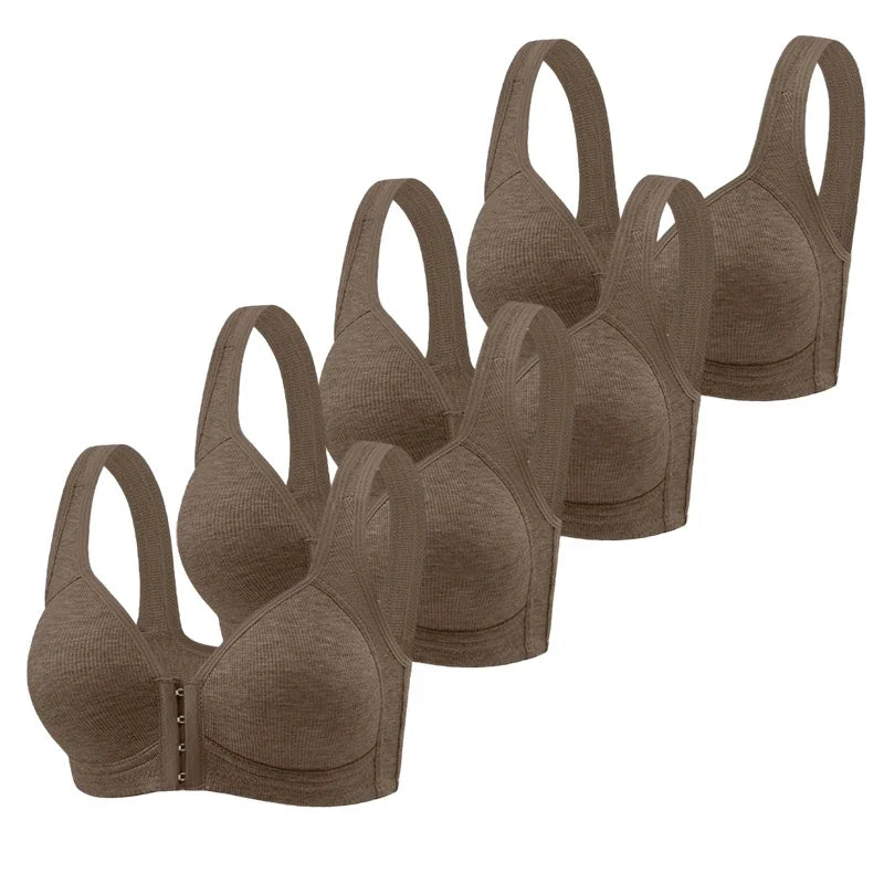 Set of brown bras arranged in a row on a white background