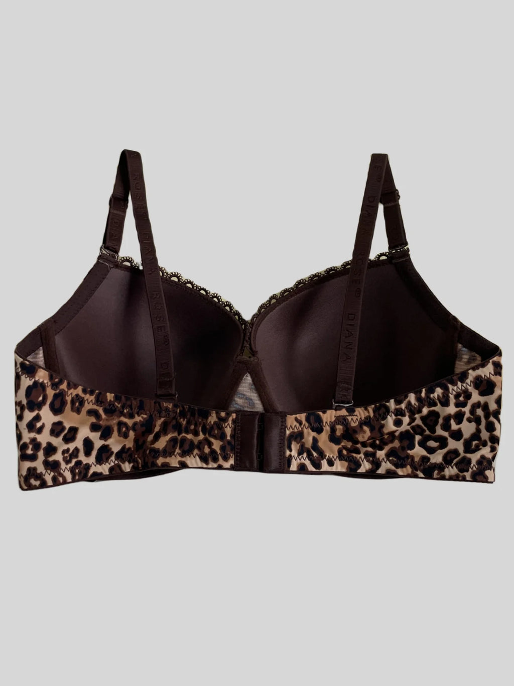 Leopard print bra with brown accents on a light gray background