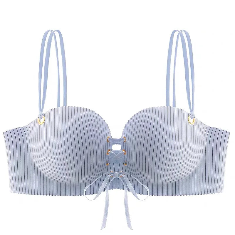 A light blue and white vertically striped bra with thin shoulder straps, gold-tone eyelets, and lace-up front detailing with a small bow, shown on a plain white background.
