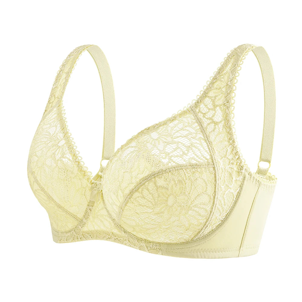 Yellow lace bra on a white background