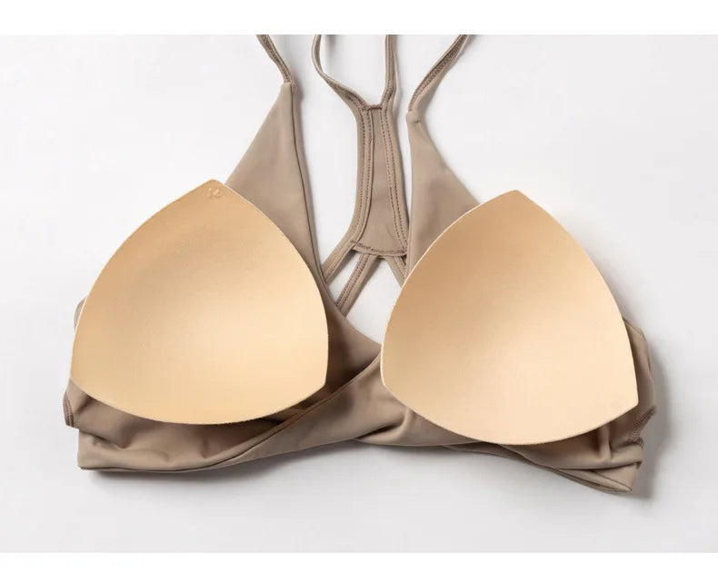 Beige bra on a white background