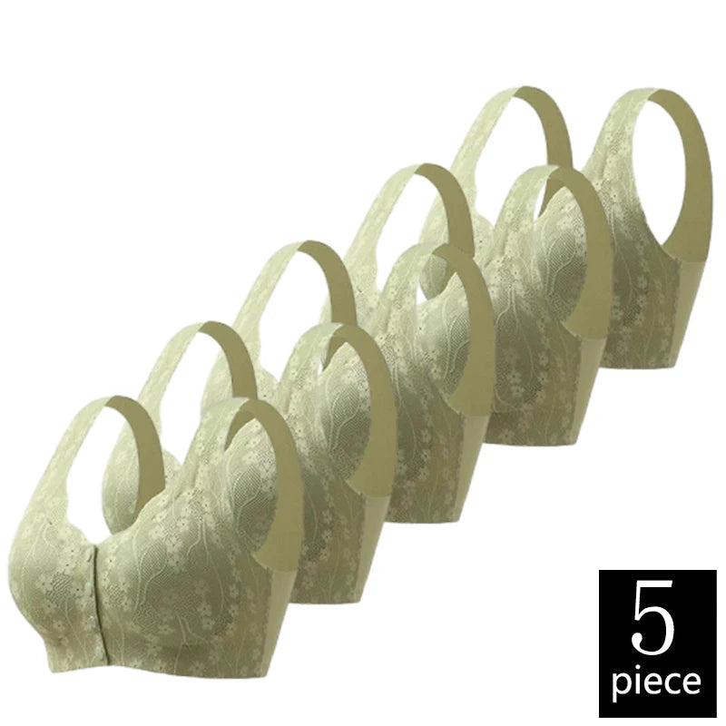 Set of five green bras on a white background